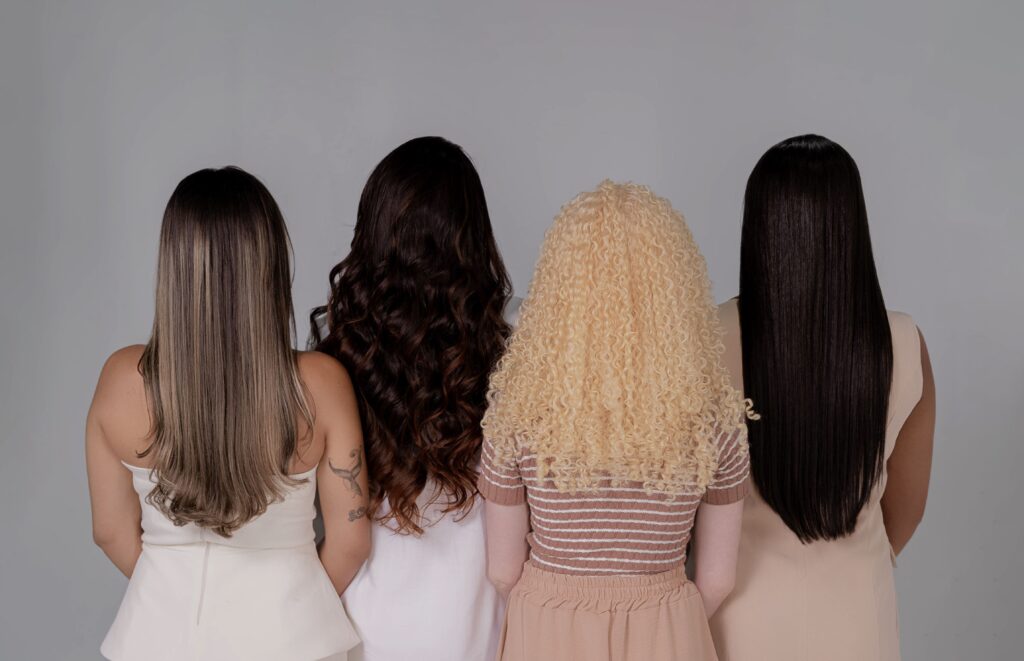 Different hair types including straight, wavy, curly, and coily hair.